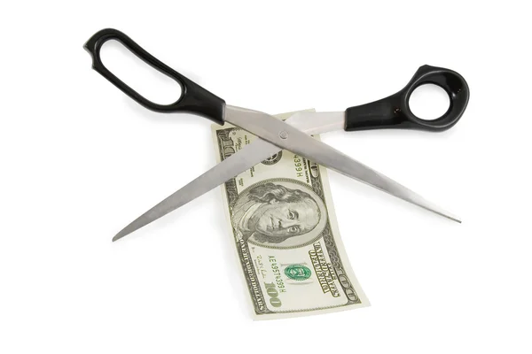 Scissors cutting a 100 dollars banknote — Stock Photo, Image