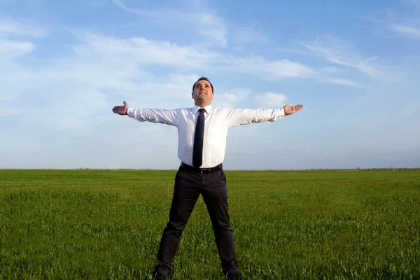 Businessman take energy from nature — Stock Photo, Image