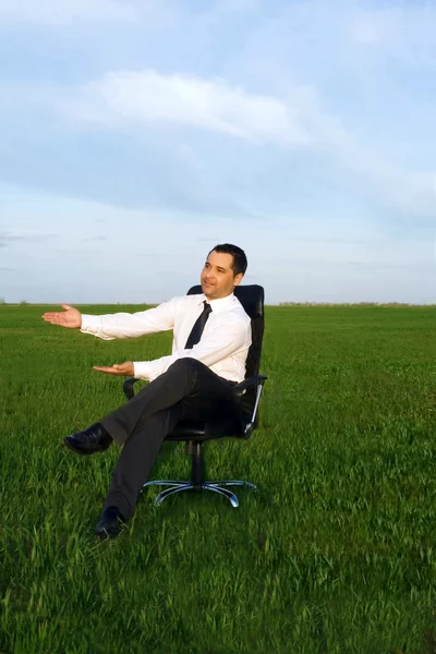 Businessman take energy from nature — Stock Photo, Image