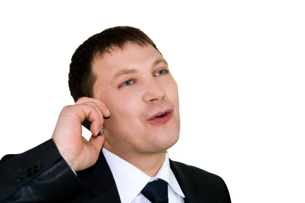 Businessman discussing to the mobile phone — Stockfoto