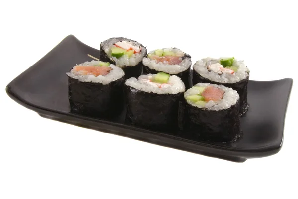 白上孤立的黑色板上寿司 — 图库照片