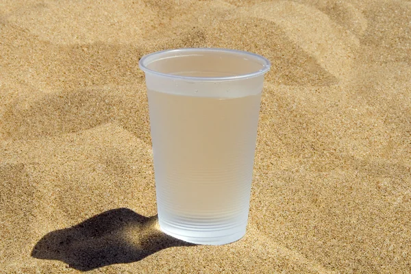 stock image Plastic glass with water