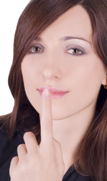 Woman with finger on lips — Stock Photo, Image