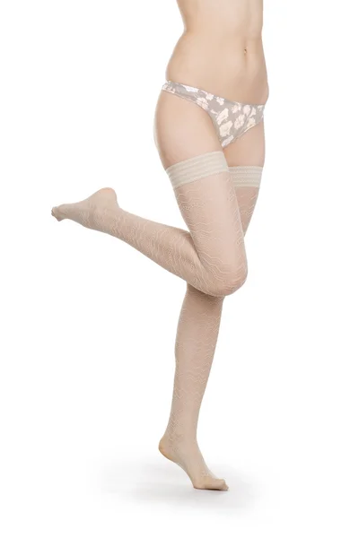 Woman legs in white stockings — Stock Photo, Image