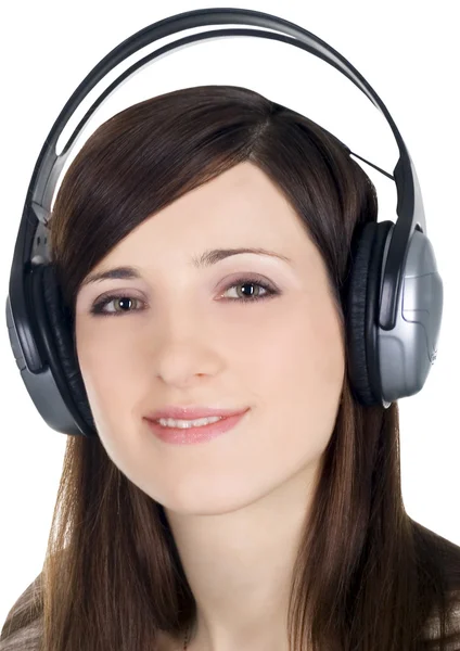 Jovem mulher em fones de ouvido — Fotografia de Stock