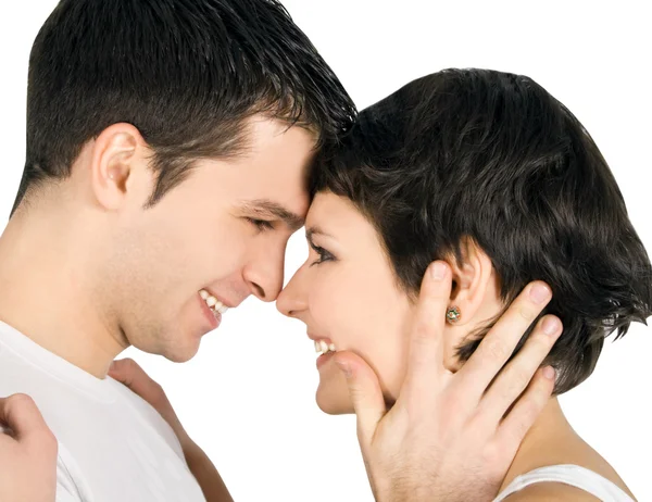 Profile of a smiling young couple in love — Stock Photo, Image