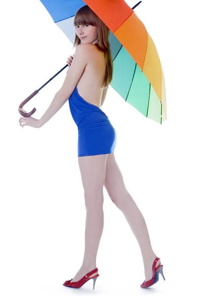 Signora in piedi con ombrello a colori — Foto Stock