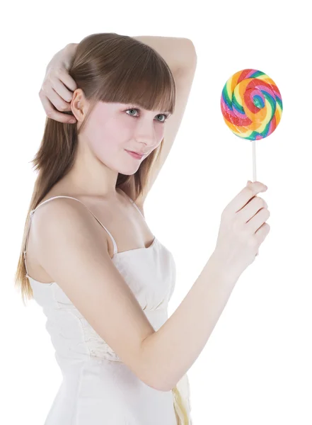 明亮的彩色棒棒糖的幸福金发的图片 — 图库照片