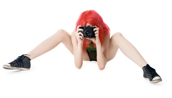 stock image Red-hair young girl with photocamera isolated on white