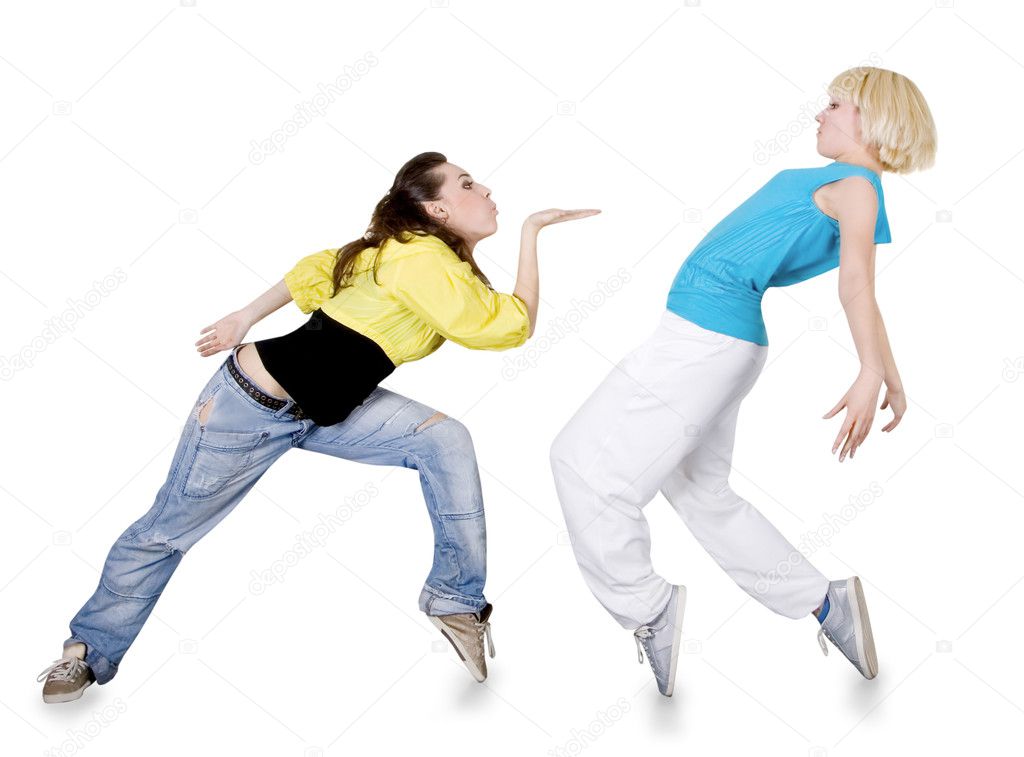 Teenage girl dancing hip-hop over white background