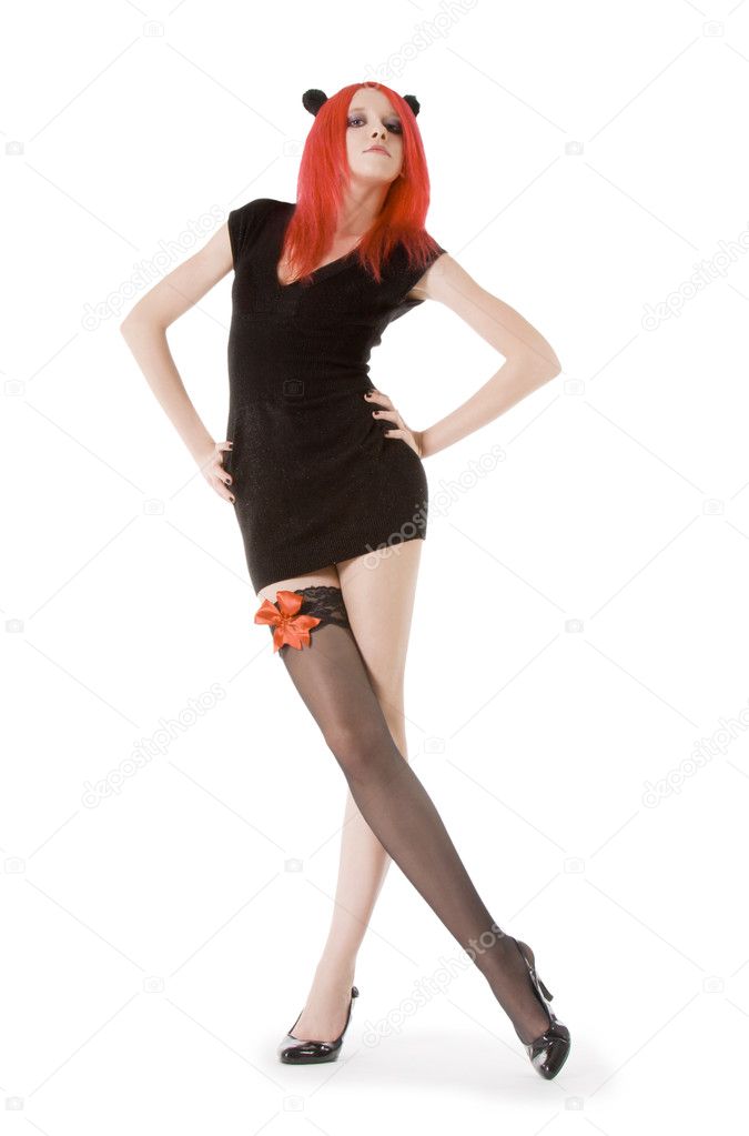 Woman in black stockings posing
