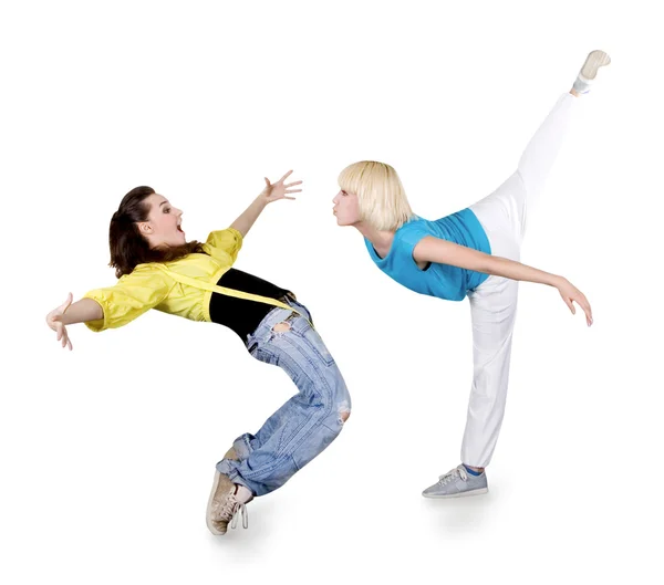 Дівчина-підліток танцює хіп-хоп на білому тлі — стокове фото