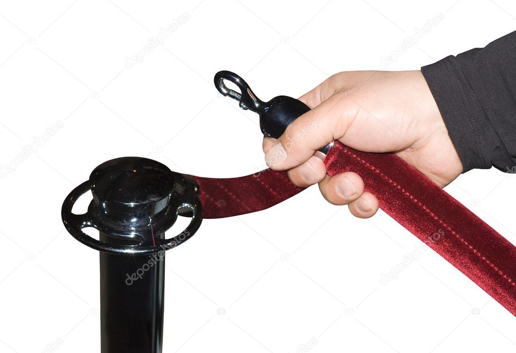 Human hand open red velvet rope