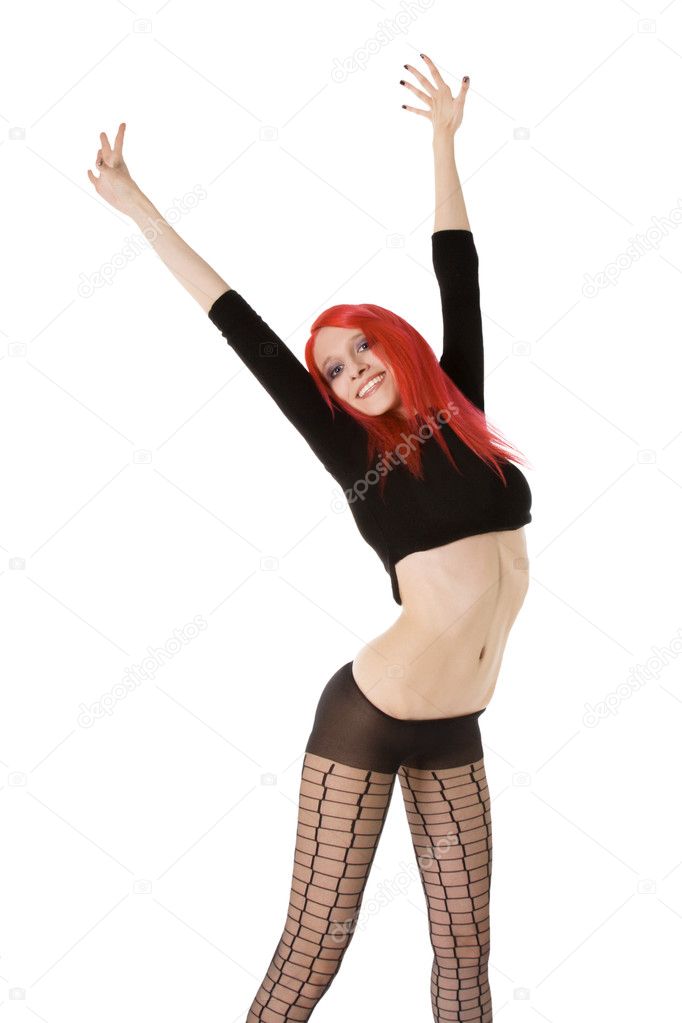 Red hair woman posing in studio
