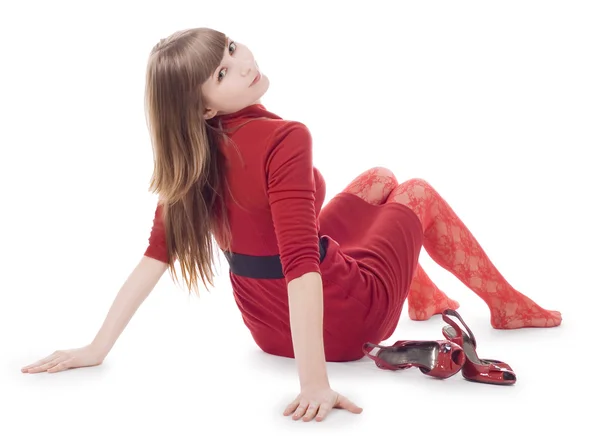 Mooie jonge dame in rode jurk vergadering — Stockfoto