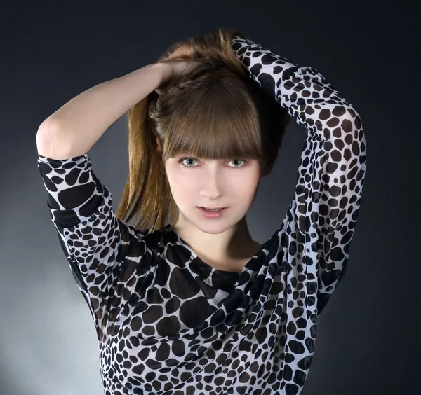 Beautiful brunette girl posing in studio — Stock Photo, Image