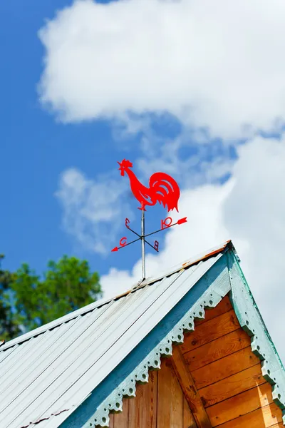 Weathercock na dachu — Zdjęcie stockowe
