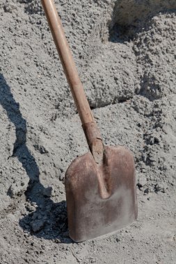 A shovel and a sand clipart