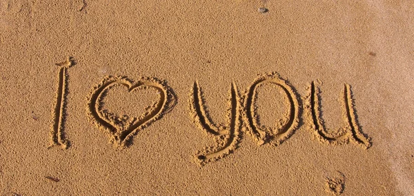 Inscription on the sand, I love you — Stock Photo, Image