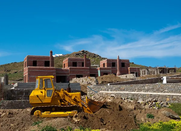 stock image Yellow bulldozer on construction