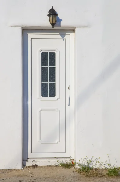 White street door and lantern — Stock Photo, Image
