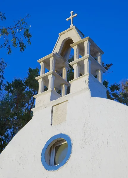 Campanario de iglesia con ventana azul —  Fotos de Stock
