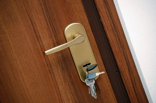 Klamka drzwi z kluczami Obrazek Stockowy