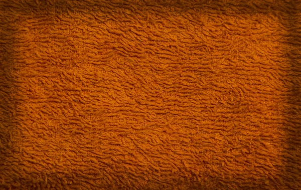 Achtergrond van een oranje handdoek — Stockfoto