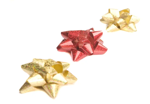 Golden and red bow — Stock Photo, Image