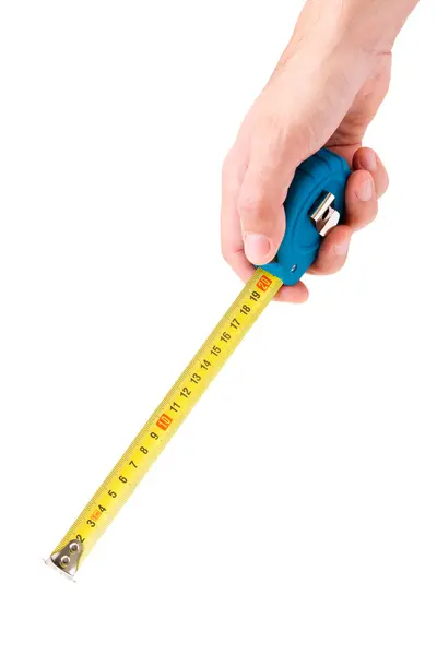 Man's hand holding tape measure on white background — Stock Photo, Image