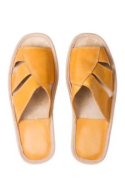 Isolated yellow leather comfortable slippers — Stock Photo, Image