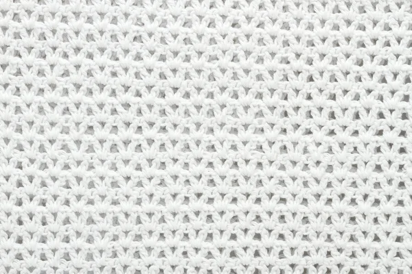 Tejer textura blanca, fondo de ganchillo — Foto de Stock