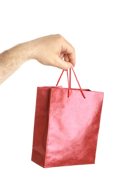 Paper bags in male hand — Stock Photo, Image