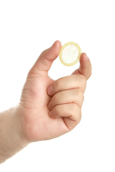 La mano dell'uomo con il preservativo — Foto Stock