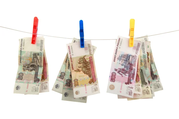Dinheiro russo está pendurado em rodadas de roupa — Fotografia de Stock