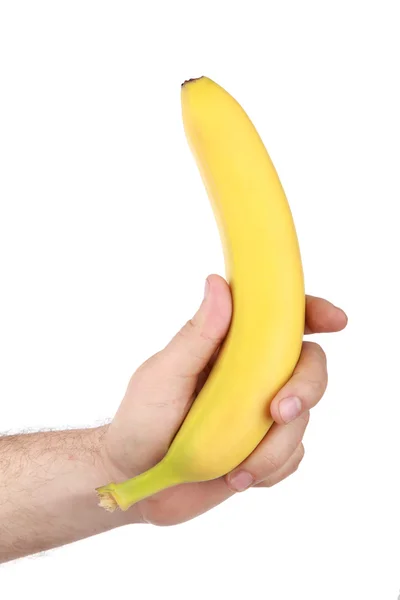 La mano del hombre sostiene un plátano — Foto de Stock