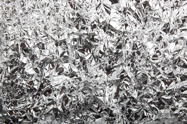 Abstract crumpled silver aluminum — Stock Photo, Image