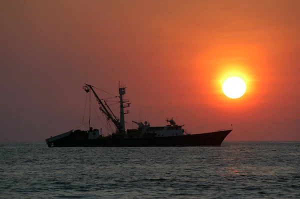 Pôr do sol sobre o mar em Puerto Escondido — Fotografia de Stock