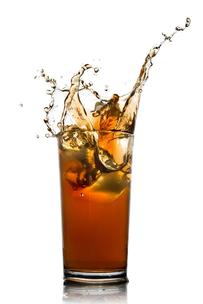 Beautiful splash of cola in glass — Stock Photo, Image