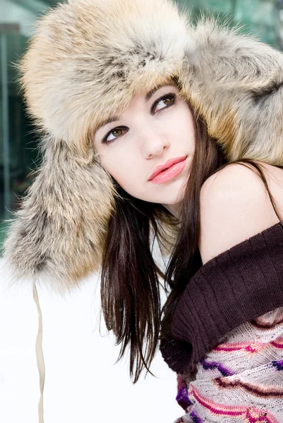 Winter portrait of young woman in fur hat — Stock Photo, Image