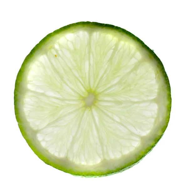 Green lime with slice — Stock Photo, Image