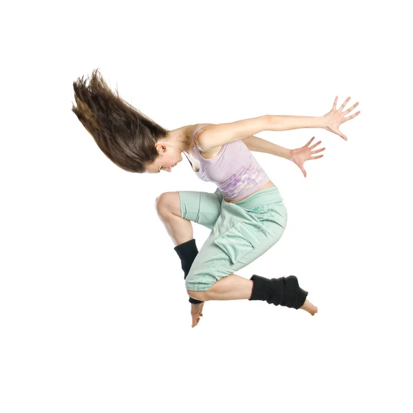 Стрибки молодої танцівниці — стокове фото