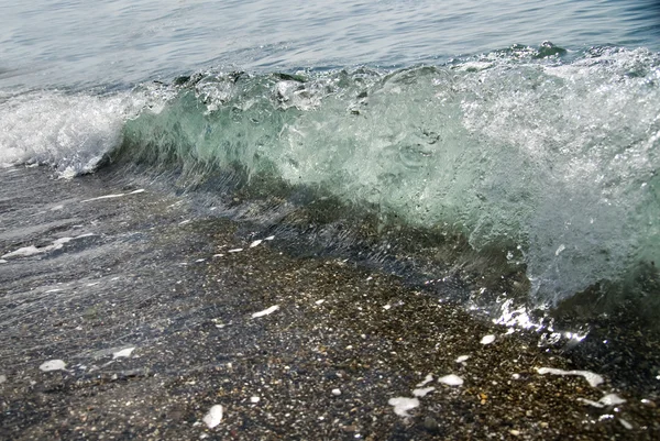 Piedras de arena y olas de agua —  Fotos de Stock