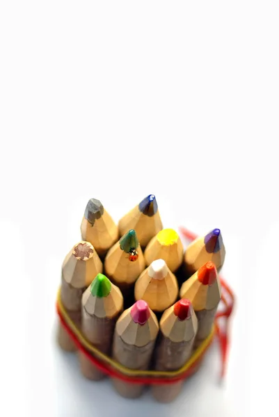 Lieveheersbeestje op kleur potloden — Stockfoto