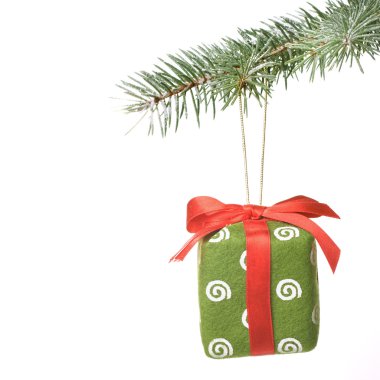 Christmas gift on fir tree branch clipart