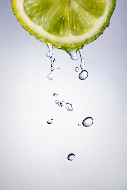 Fresh water drops on lemon clipart