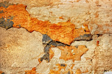 Texture of the old stucco wall with cracks clipart