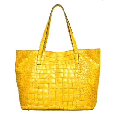 Luxury yellow leather female bag isolated on whit clipart