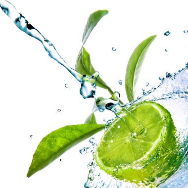 Water drops on lime with green leaves isolated on white clipart