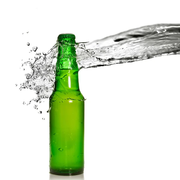 Green beer bottle with water splash — Stock Photo, Image